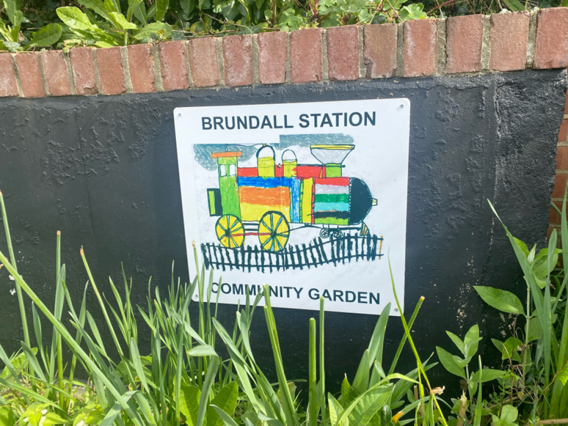 Brundall station community garden sign